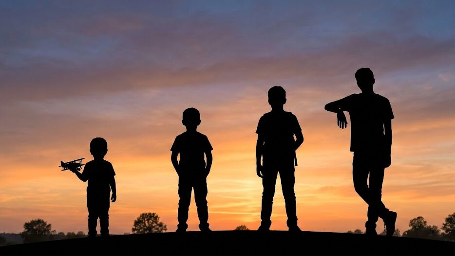 A sequence of four dark silhouettes of a child growing into an adolescent against a warm sunset sky.